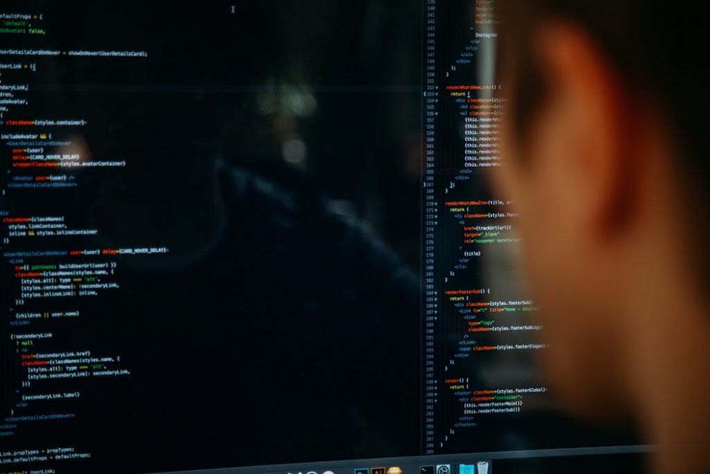 man looking at computer screen